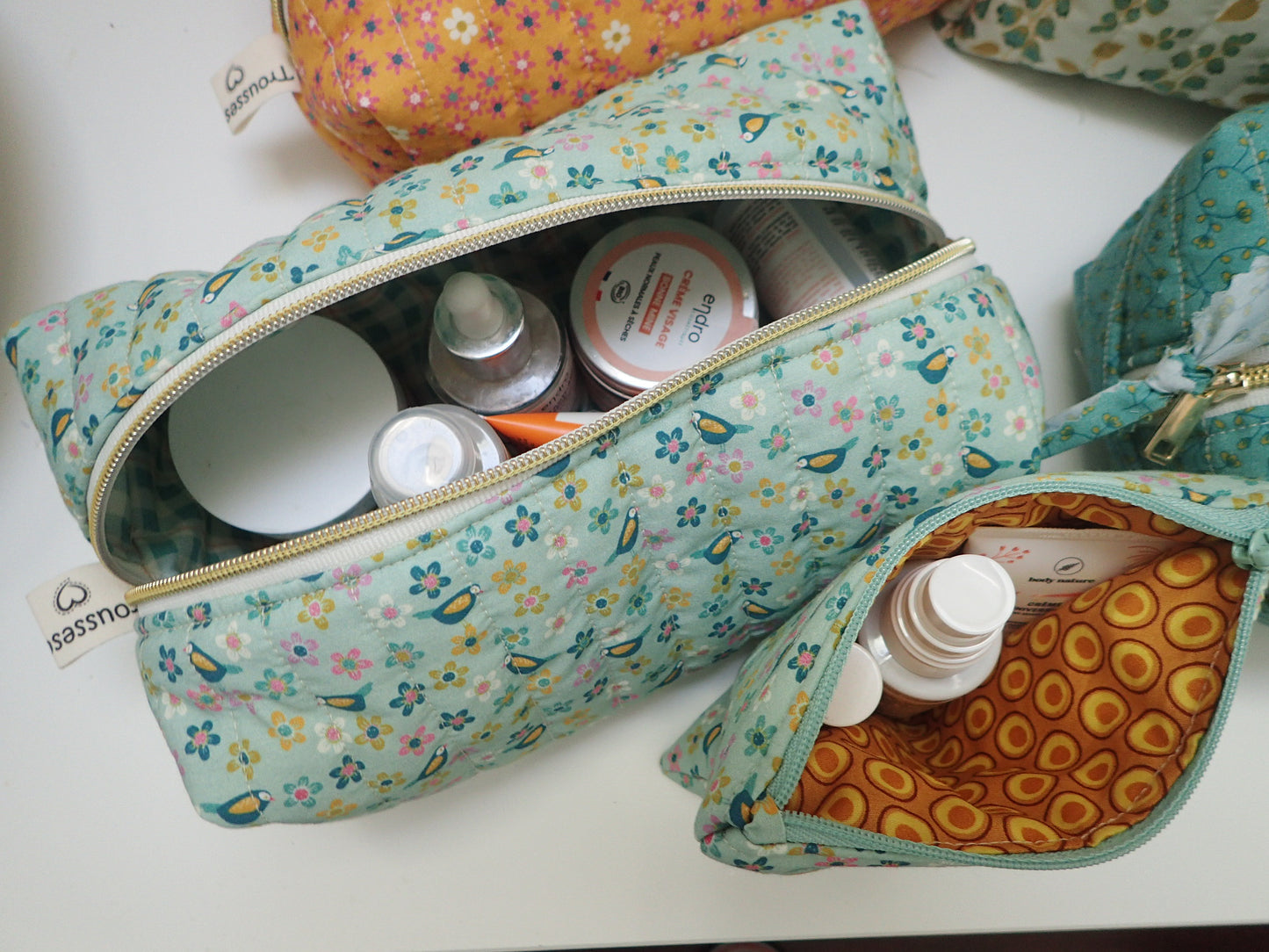 Trousse de toilette et sa pochette assortie