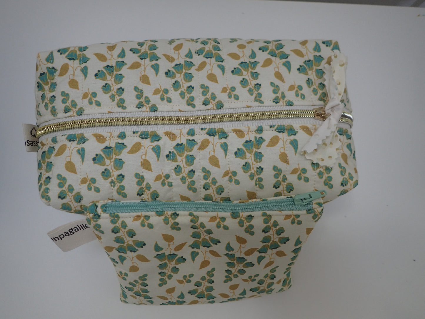 Trousse de toilette et sa pochette assortie