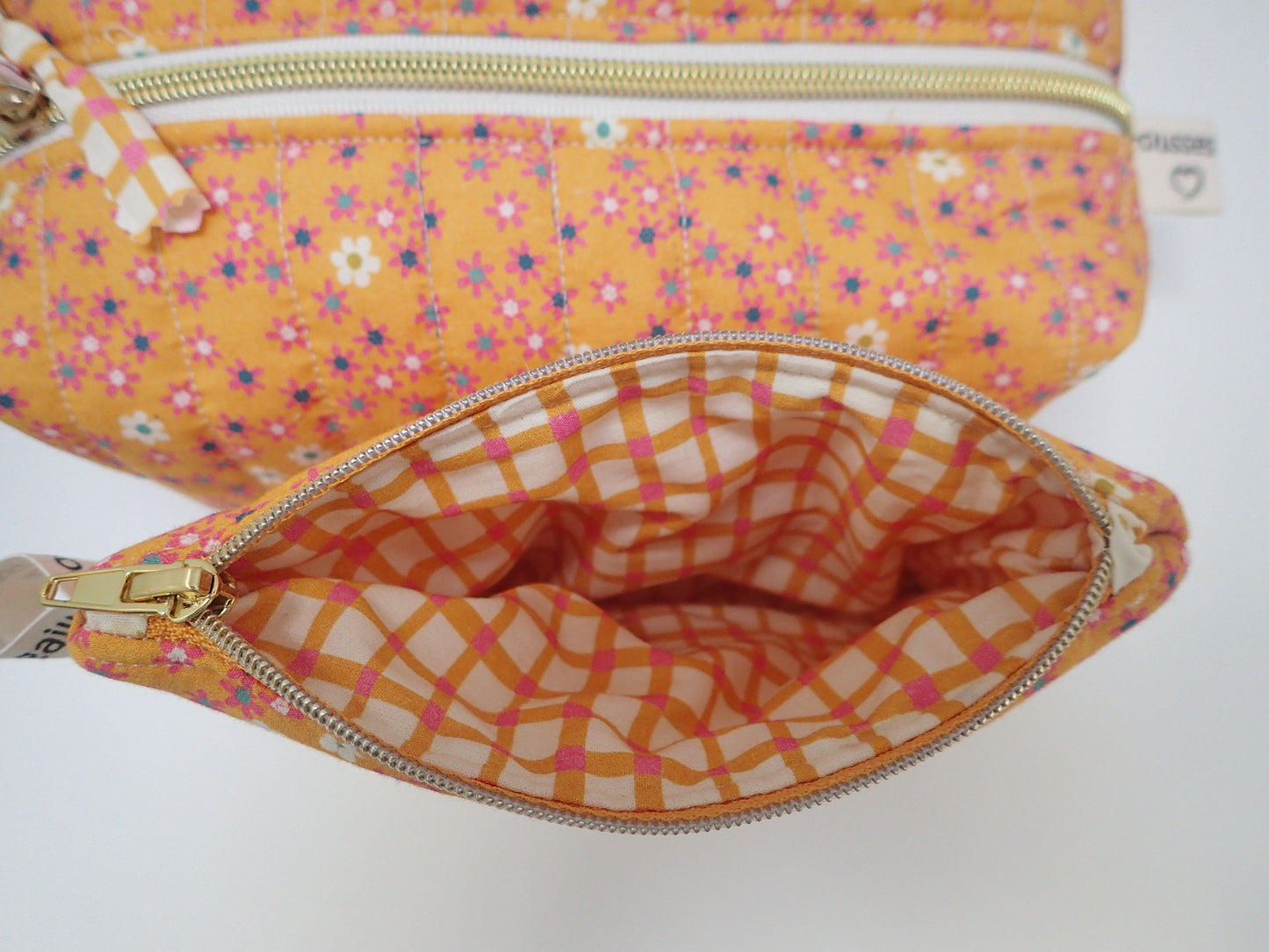 Trousse de toilette et sa pochette assortie