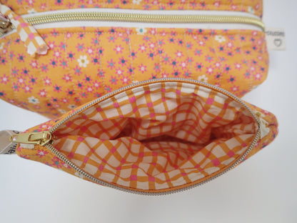 Trousse de toilette et sa pochette assortie
