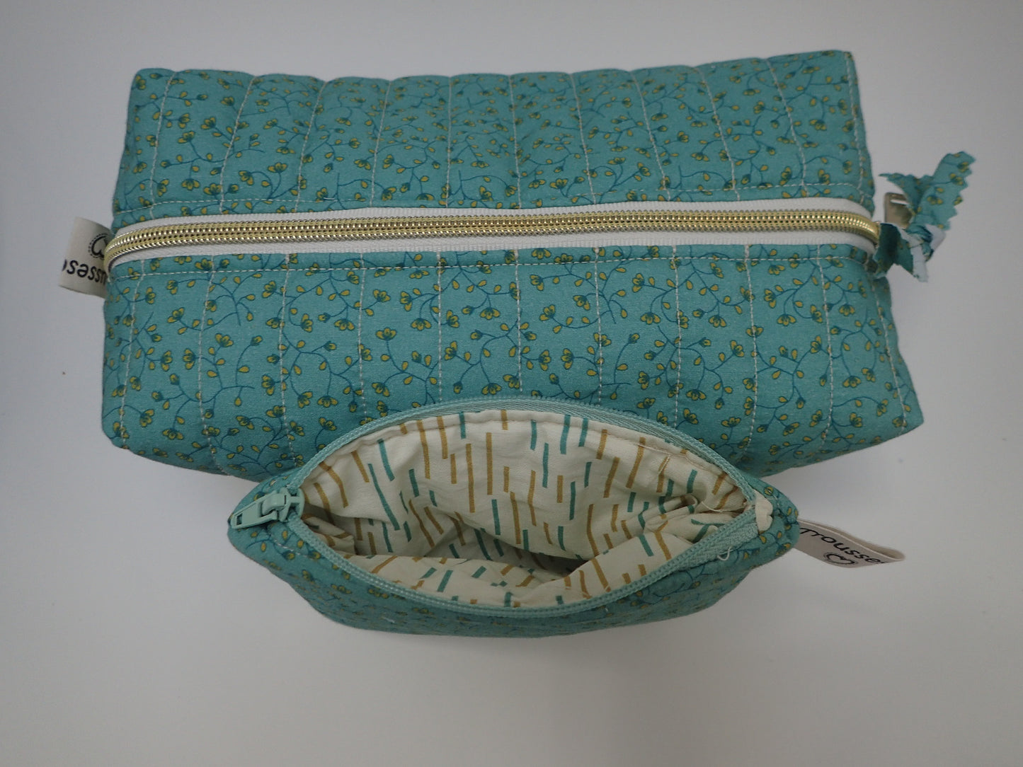 Trousse de toilette et sa pochette assortie